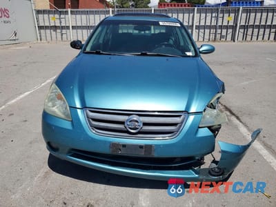 Piąte zdjęcie samochodu w środku: 2003 NISSAN ALTIMA 2.5 S VIN:1N4AL11E43C228944 - miniatura