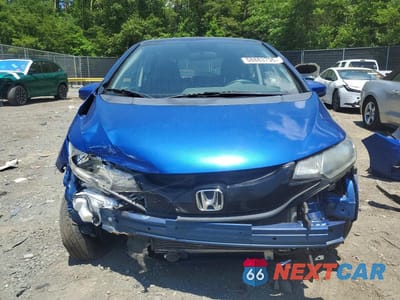 Piąte zdjęcie samochodu w środku: 2016 HONDA FIT LX VIN:JHMGK5H57GS007174 - miniatura