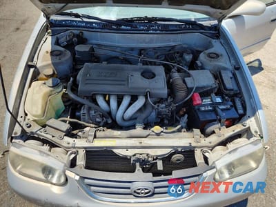 Zdjęcie 11 z 12 samochodu: 2001 TOYOTA COROLLA LE VIN:1NXBR12E01Z461539 - miniatura