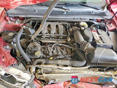 Zdjęcie 11 z 13 samochodu: 2013 FORD TAURUS SEL VIN:1FAHP2E8XDG212089 - miniatura