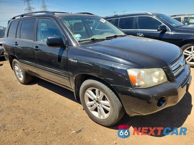 Czwarte zdjęcie samochodu z boku: 2007 TOYOTA HIGHLANDER HYBRID VIN:JTEHW21A570044909 - miniatura