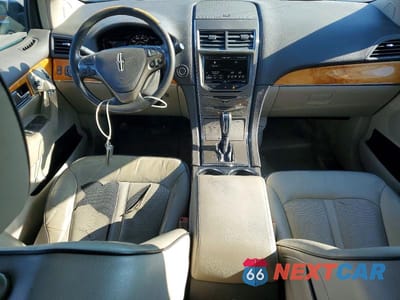 Zdjęcie 8 z 13 samochodu: 2014 LINCOLN MKX VIN:2LMDJ6JK9EBL17542 - miniatura