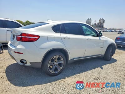 Trzecie zdjęcie samochodu z tyłu: 2014 BMW X6 XDRIVE35I VIN:5UXFG2C53E0H10057 - miniatura