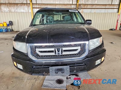 Piąte zdjęcie samochodu w środku: 2011 HONDA RIDGELINE RTL VIN:5FPYK1F52BB001393 - miniatura