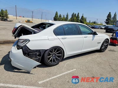 Trzecie zdjęcie samochodu z tyłu: 2013 BMW 740 I VIN:WBAYA6C50DD143813 - miniatura