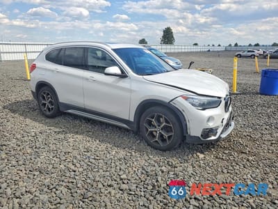 Czwarte zdjęcie samochodu z boku: 2018 BMW X1 XDRIVE28I VIN:WBXHT3C3XJ3H31297 - miniatura