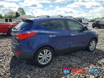 Trzecie zdjęcie samochodu z tyłu: 2013 HYUNDAI TUCSON LIMITED VIN:KM8JUCAC2DU581823 - miniatura