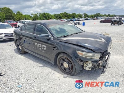 Czwarte zdjęcie samochodu z boku: 2013 FORD TAURUS POLICE INTERCEPTOR VIN:1FAHP2M80DG158027 - miniatura