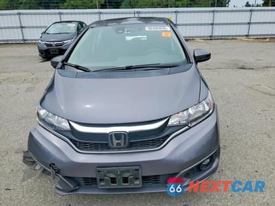 Piąte zdjęcie samochodu w środku: 2019 HONDA FIT EX VIN:3HGGK5H86KM739908 - miniatura