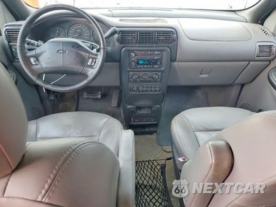 Zdjęcie 15 z 26 samochodu: 2004 CHEVROLET VENTURE LUXURY VIN:1GNDX13E74D196759 - miniatura