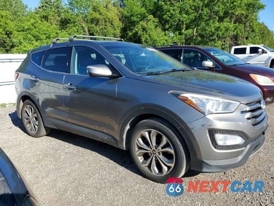 Czwarte zdjęcie samochodu z boku: 2013 HYUNDAI SANTA FE SPORT 2.0T VIN:5XYZUDLA7DG107912 - miniatura