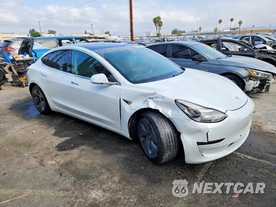 Czwarte zdjęcie samochodu z boku: 2019 TESLA MODEL 3 VIN:5YJ3E1EA7KF401491 - miniatura