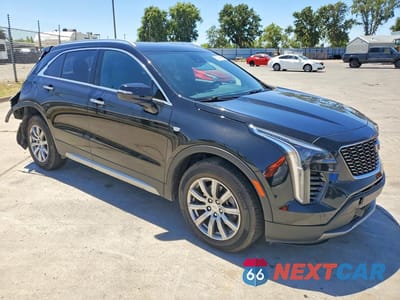 Czwarte zdjęcie samochodu z boku: 2022 CADILLAC XT4 PREMIUM LUXURY VIN:1GYFZDR49NF100125 - miniatura