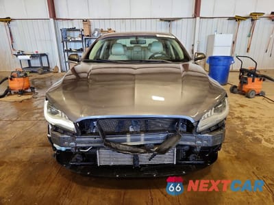 Piąte zdjęcie samochodu w środku: 2017 LINCOLN MKZ SELECT VIN:3LN6L5DC8HR624428 - miniatura