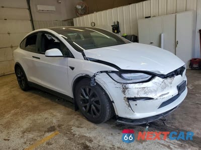 Czwarte zdjęcie samochodu z boku: 2022 TESLA MODEL X VIN:7SAXCDE59NF343581 - miniatura