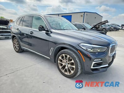 Czwarte zdjęcie samochodu z boku: 2021 BMW X5 XDRIVE40I VIN:5UXCR6C05M9H41930 - miniatura