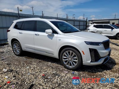 Czwarte zdjęcie samochodu z boku: 2023 CADILLAC XT6 PREMIUM LUXURY VIN:1GYKPDRS7PZ173059 - miniatura