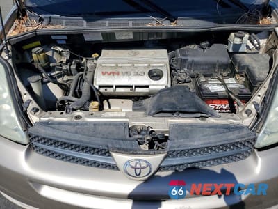 Zdjęcie 12 z 13 samochodu: 2004 TOYOTA SIENNA LE VIN:5TDBA23C74S003844 - miniatura