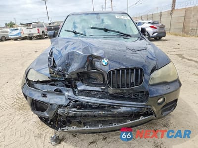 Piąte zdjęcie samochodu w środku: 2011 BMW X5 XDRIVE35I VIN:5UXZV4C58BL405546 - miniatura