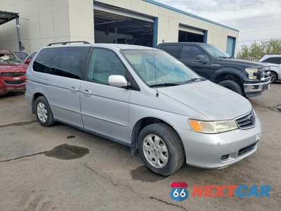 Czwarte zdjęcie samochodu z boku: 2002 HONDA ODYSSEY EX VIN:2HKRL18652H547011 - miniatura