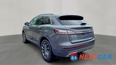 Trzecie zdjęcie samochodu z tyłu: 2022 LINCOLN NAUTILUS RESERVE VIN:2LMPJ8K93NBL22482 - miniatura
