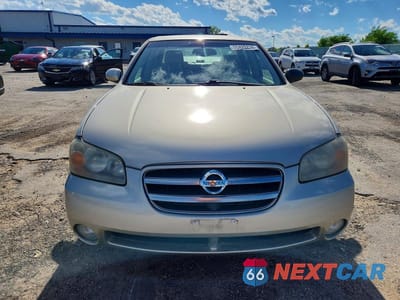 Piąte zdjęcie samochodu w środku: 2003 NISSAN MAXIMA GXE VIN:JN1DA31A63T431813 - miniatura