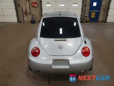 Zdjęcie 6 z 12 samochodu: 2002 VOLKSWAGEN NEW BEETLE GLS TDI VIN:3VWCP21CX2M439989 - miniatura