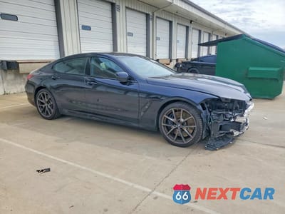 Czwarte zdjęcie samochodu z boku: 2022 BMW M850XI VIN:WBAGV8C03NCK22206 - miniatura