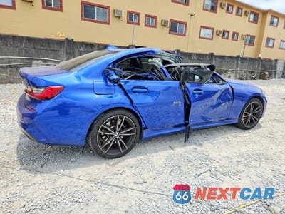 Trzecie zdjęcie samochodu z tyłu: 2021 BMW 330E VIN:3MW5P7J01M8B77738 - miniatura