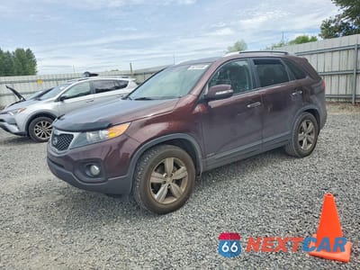 2012 KIA SORENTO EX 5XYKUDA61CG256377 - główne zdjęcie licytacji z USA - miniatura