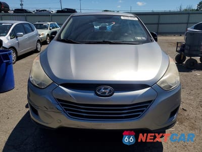 Piąte zdjęcie samochodu w środku: 2011 HYUNDAI TUCSON GL VIN:KM8JT3AB2BU240834 - miniatura