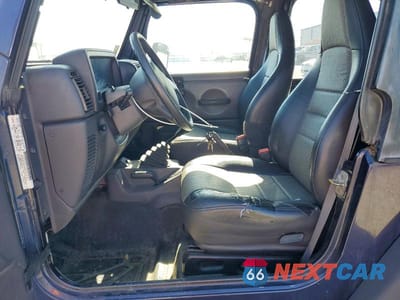 Zdjęcie 7 z 12 samochodu: 1999 JEEP WRANGLER VIN:1J4FY29P2XP472503 - miniatura