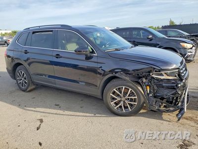 Czwarte zdjęcie samochodu z boku: 2019 VOLKSWAGEN TIGUAN SE VIN:3VV3B7AXXKM115993 - miniatura