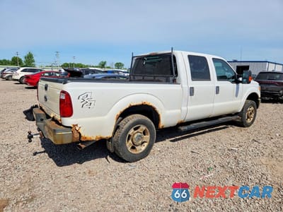Trzecie zdjęcie samochodu z tyłu: 2014 FORD F250 SUPER DUTY VIN:1FT7W2B62EEB71031 - miniatura