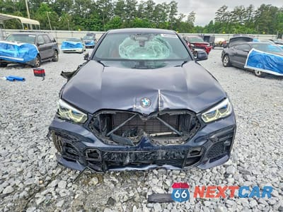 Piąte zdjęcie samochodu w środku: 2022 BMW X6 XDRIVE40I VIN:5UXCY6C00N9L56406 - miniatura