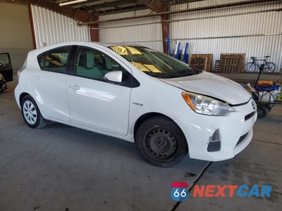 Czwarte zdjęcie samochodu z boku: 2014 TOYOTA PRIUS C ONE VIN:JTDKDTB37E1068545 - miniatura