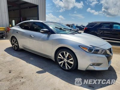 Czwarte zdjęcie samochodu z boku: 2016 NISSAN MAXIMA PLATINUM VIN:1N4AA6AP3GC429437 - miniatura