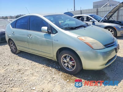 Czwarte zdjęcie samochodu z boku: 2006 TOYOTA PRIUS BASE VIN:JTDKB20UX63141621 - miniatura