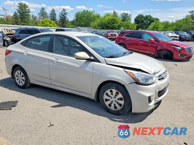 Czwarte zdjęcie samochodu z boku: 2015 HYUNDAI ACCENT GLS VIN:KMHCT4AE3FU927433 - miniatura