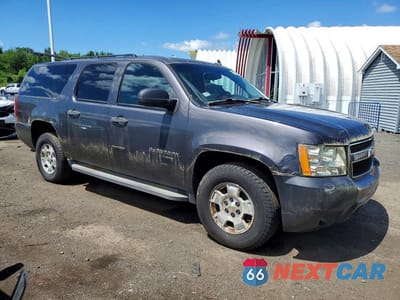 Czwarte zdjęcie samochodu z boku: 2010 CHEVROLET SUBURBAN K1500 LS VIN:1GNUKHE36AR271985 - miniatura