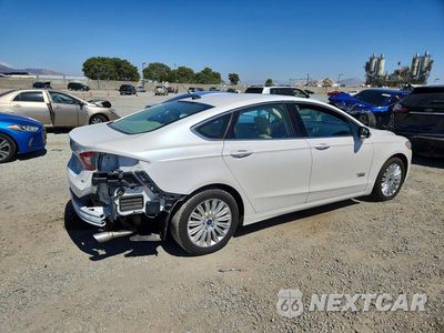 Trzecie zdjęcie samochodu z tyłu: 2014 FORD FUSION SE PHEV VIN:3FA6P0PU2ER142250 - miniatura