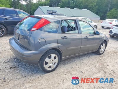 Trzecie zdjęcie samochodu z tyłu: 2004 FORD FOCUS ZX5 VIN:3FAFP37Z84R110902 - miniatura