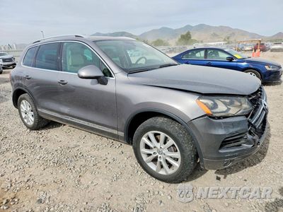 Czwarte zdjęcie samochodu z boku: 2013 VOLKSWAGEN TOUAREG V6 VIN:WVGEF9BPXDD003209 - miniatura