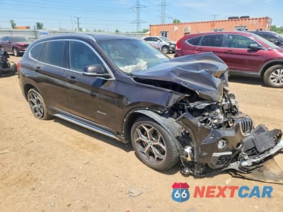Czwarte zdjęcie samochodu z boku: 2016 BMW X1 XDRIVE28I VIN:WBXHT3C3XGP885488 - miniatura