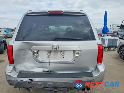 Zdjęcie 6 z 14 samochodu: 2003 HONDA PILOT EXL VIN:2HKYF18573H555218 - miniatura
