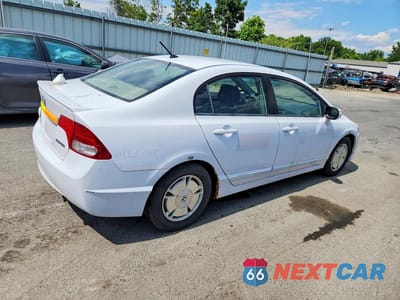 Trzecie zdjęcie samochodu z tyłu: 2011 HONDA CIVIC HYBRID VIN:JHMFA3F21BS000404 - miniatura