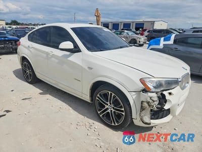 Czwarte zdjęcie samochodu z boku: 2015 BMW X4 XDRIVE35I VIN:5UXXW5C50F0E88572 - miniatura