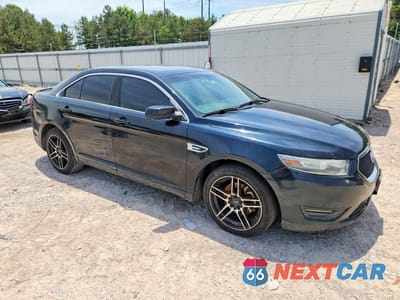 Czwarte zdjęcie samochodu z boku: 2014 FORD TAURUS SEL VIN:1FAHP2E83EG143957 - miniatura