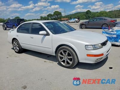 Czwarte zdjęcie samochodu z boku: 1996 NISSAN MAXIMA GXE VIN:JN1CA21D9TM417138 - miniatura