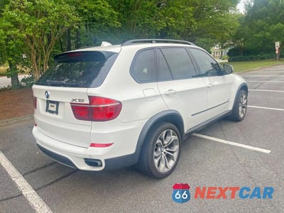 Czwarte zdjęcie samochodu z boku: 2012 BMW X5 XDRIVE50I VIN:5UXZV8C52CL425283 - miniatura
